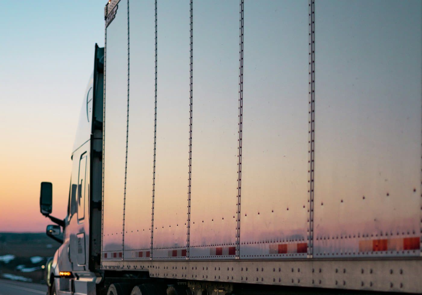Apple Logistics long-distance moving container truck transporting household goods along the Punjab highway network